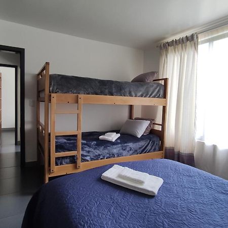 Elegante Apartamento Con Vistas Al Volcan Tungurahua بانيوس الغرفة الصورة